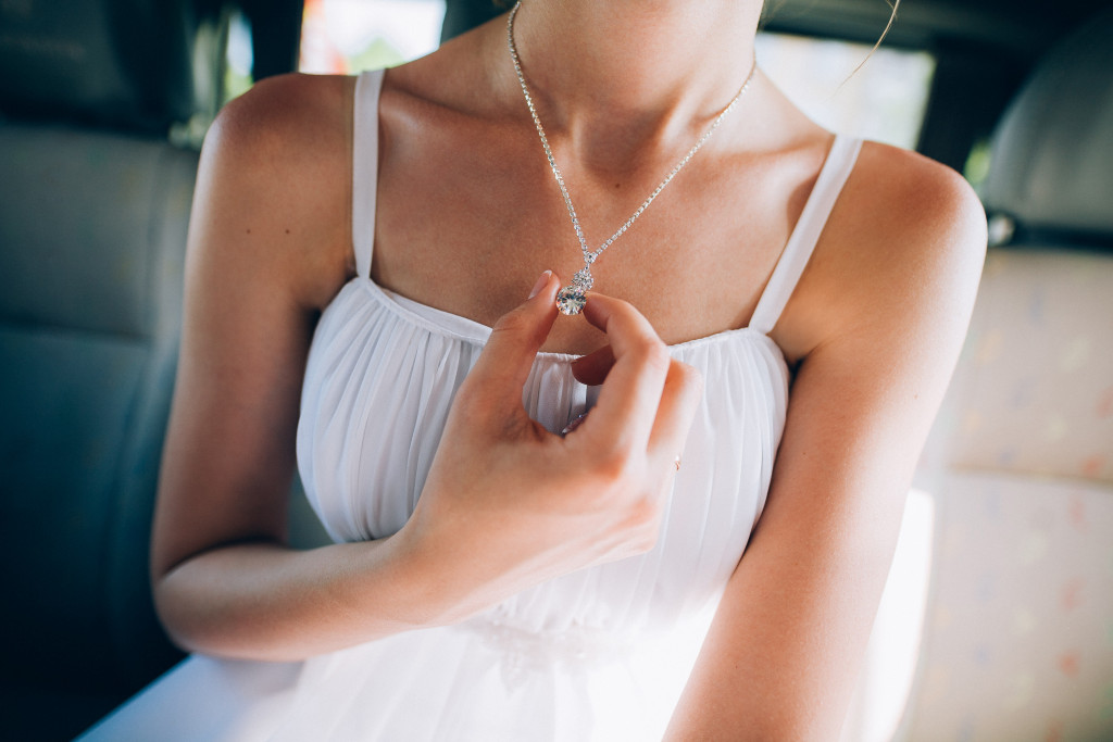 Woman wearing diamond necklace 
