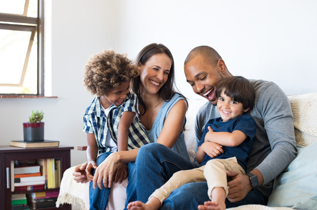 complete family in the couch