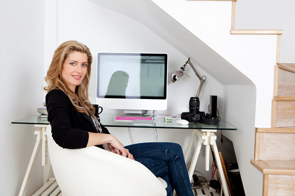 woman sitting in her home office