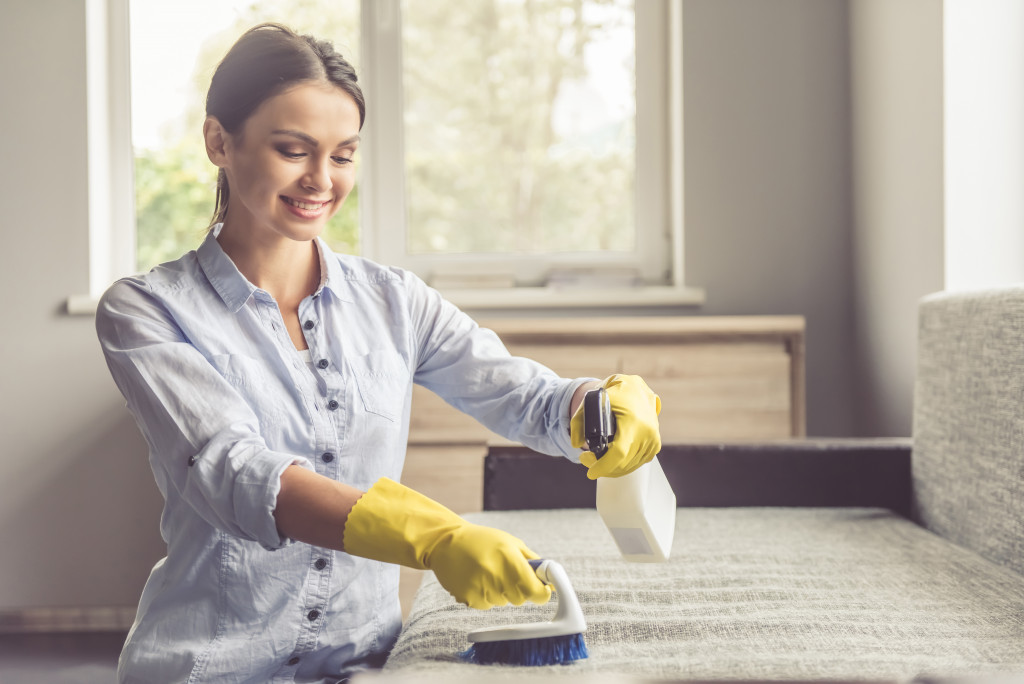 A first-time homeowner doing chores