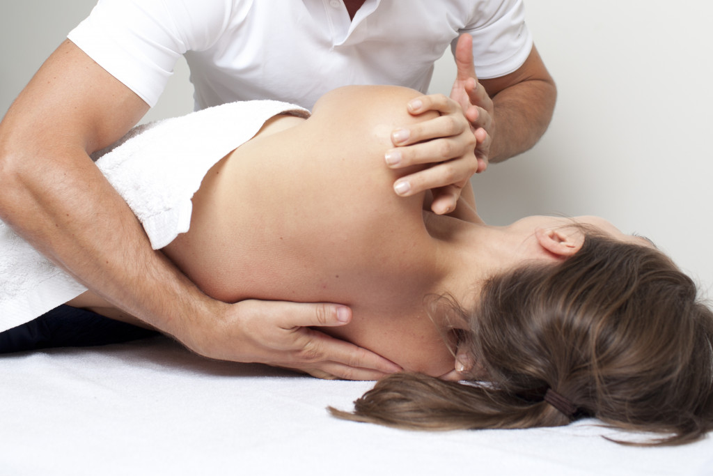 A woman getting a deep tissue massage