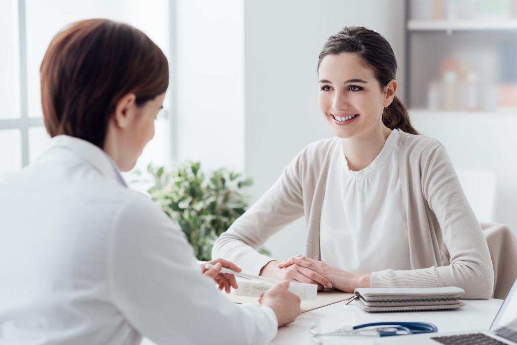 Woman consulting with her doctor in an office