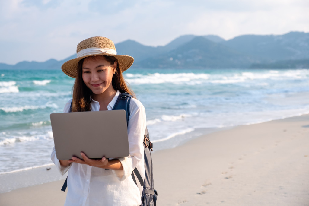 woman working by the beach